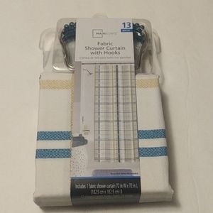 Mainstays 13 piece lightweight multi-colored printed fabric shower curtain.